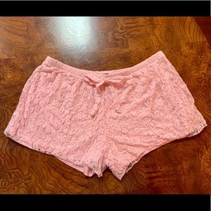 Tart pink lace short shorts.
